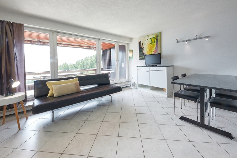 Kindvriendelijk resort met zwembad en panorama op de Zwitserse Alpen