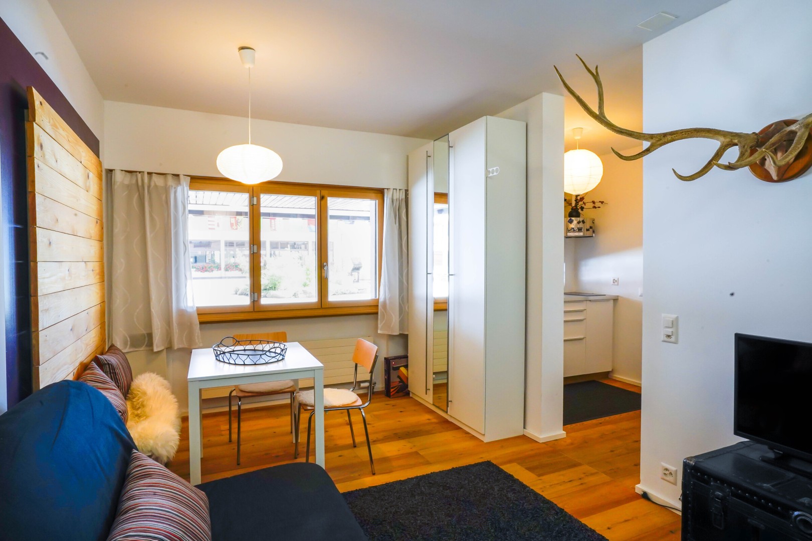 Kindvriendelijk resort met zwembad en panorama op de Zwitserse Alpen