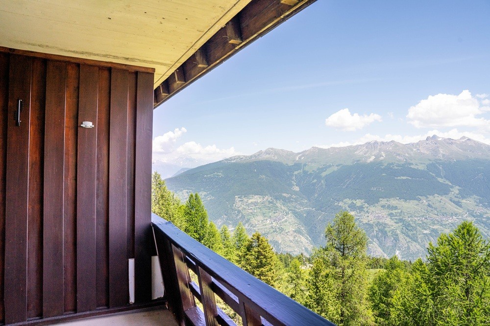 Kindvriendelijk resort met zwembad en panorama op de Zwitserse Alpen