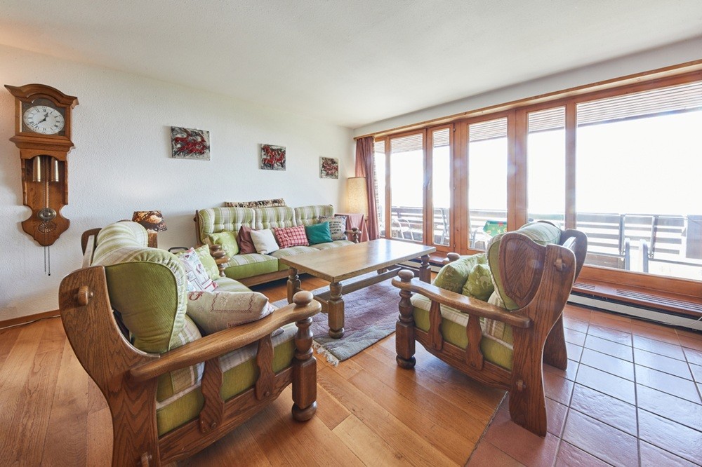 Kindvriendelijk resort met zwembad en panorama op de Zwitserse Alpen