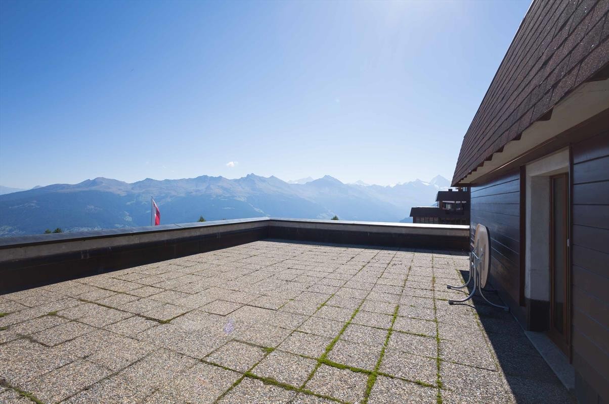 Kindvriendelijk resort met zwembad en panorama op de Zwitserse Alpen
